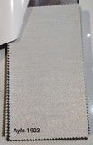 Aylo Series silver white textured blackout roller blind fabric for modern homes, condominiums and offices. Roller blinds supplier in Malaysia with supply and delivery nationwide and installation in Kuala Lumpur and Selangor by Bosita Decor.