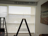 Cream 5% openness sunscreen roller blinds installed in a modern home in Malaysia