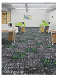 Modern office with green and grey brick patterned carpet