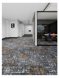 Modern office with orange and grey brick patterned carpet
