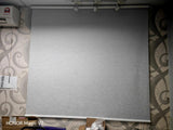 YM53 grey blackout roller blinds installed in a room, with supply and installation in KL and Selangor.